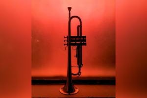 Trumpet with red backdrop